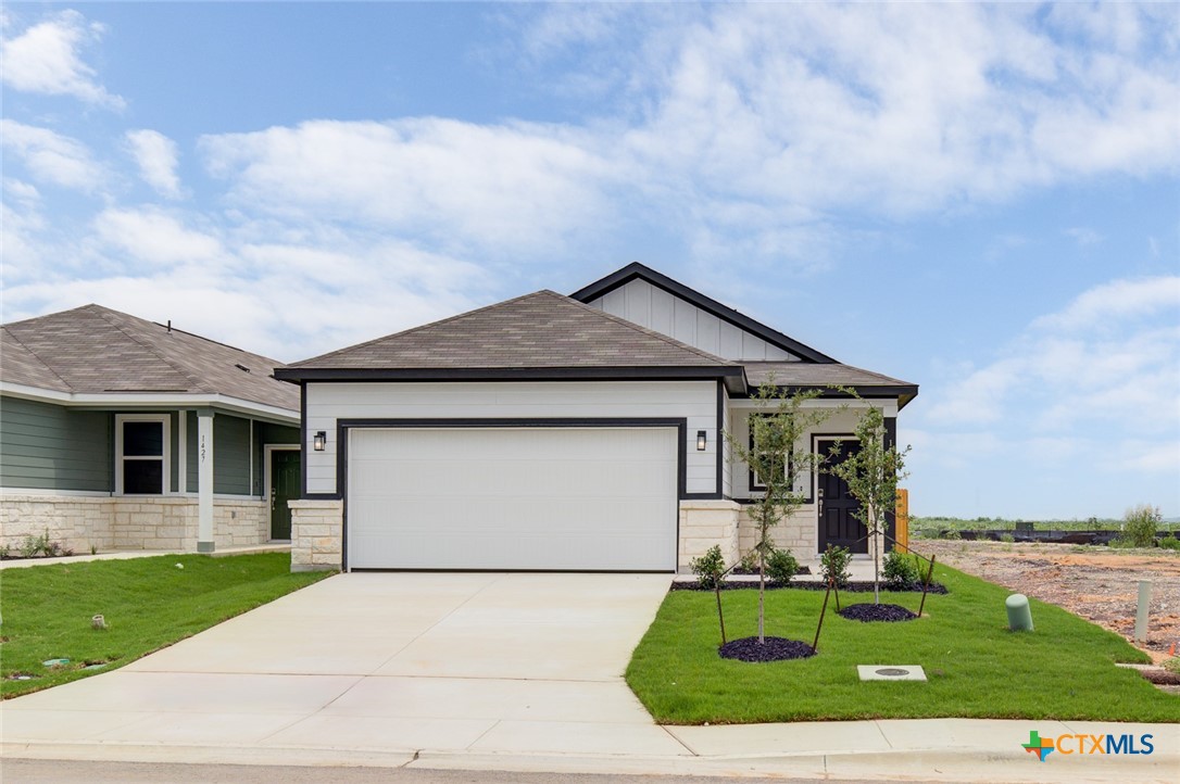 front view of house with a yard