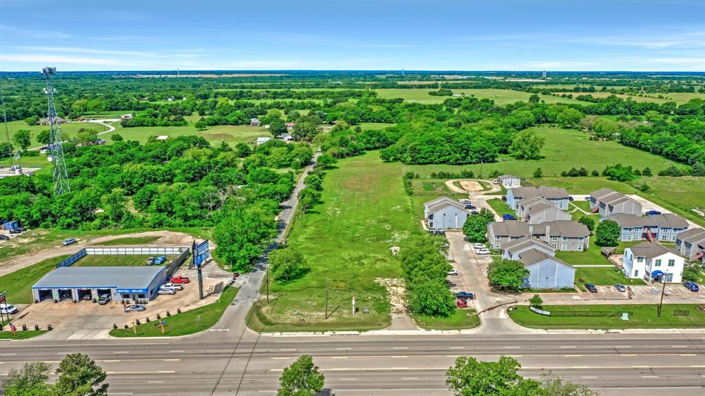 an aerial view of a house with a garden