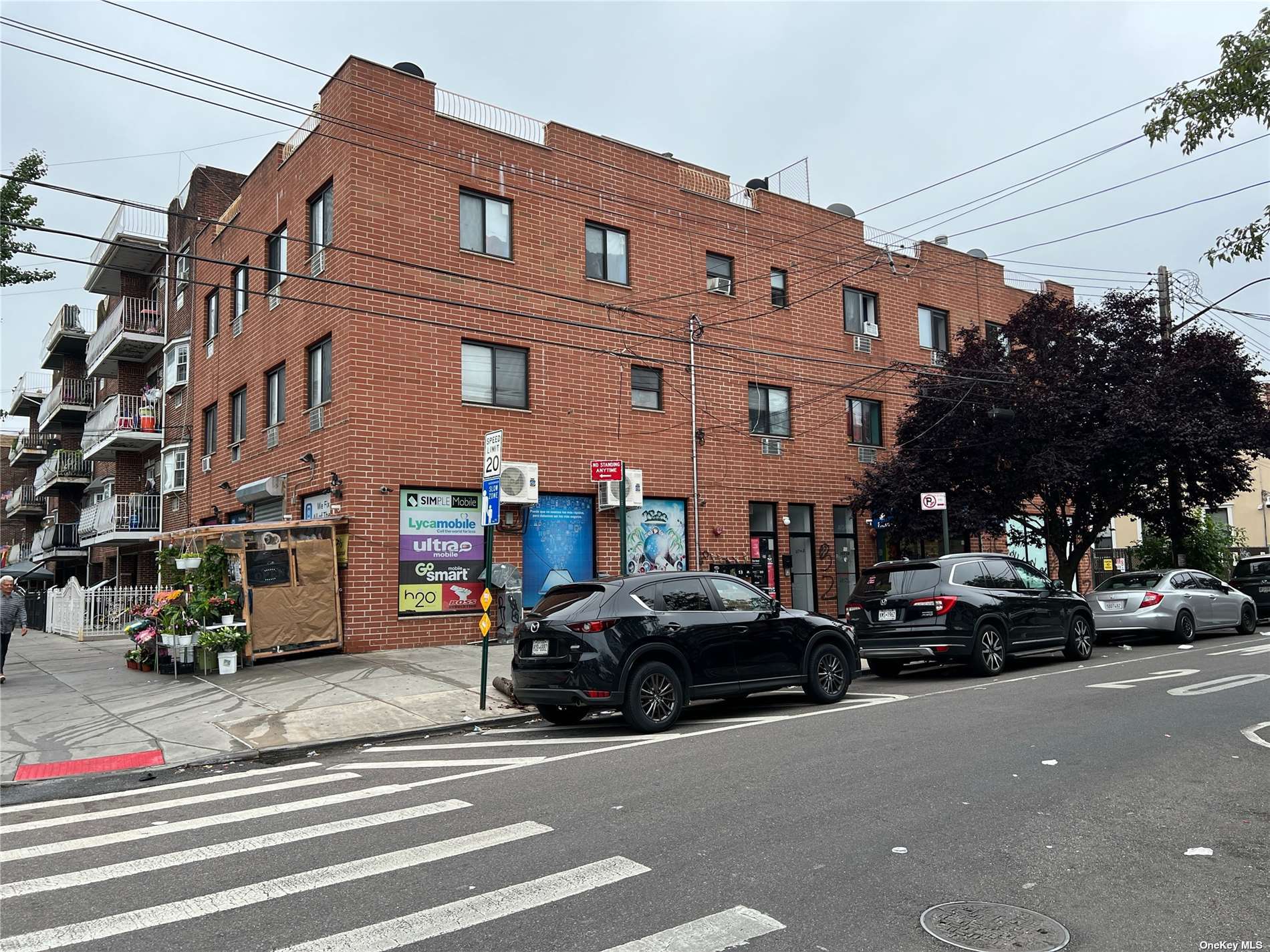 a cars parked in front of a building