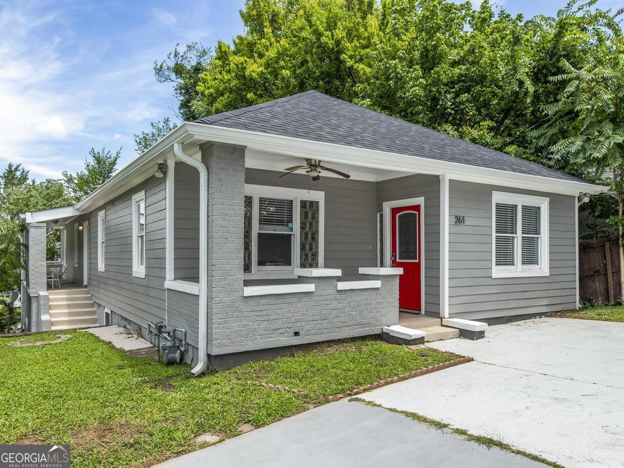 a front view of house with yard