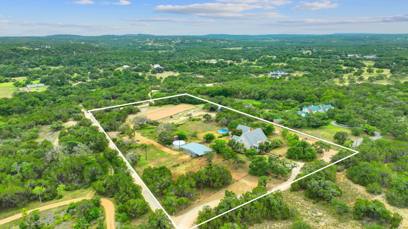 Aerial of the entire property, notice the 70'x200' riding arena at the back!