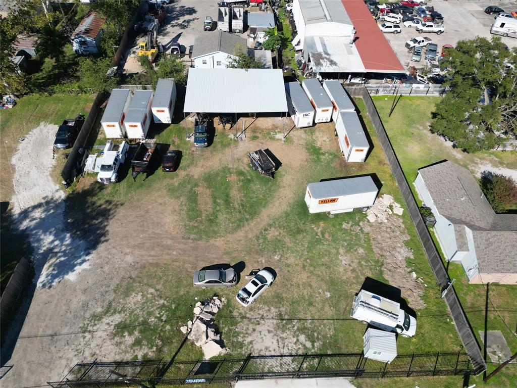 an aerial view of a house with outdoor space