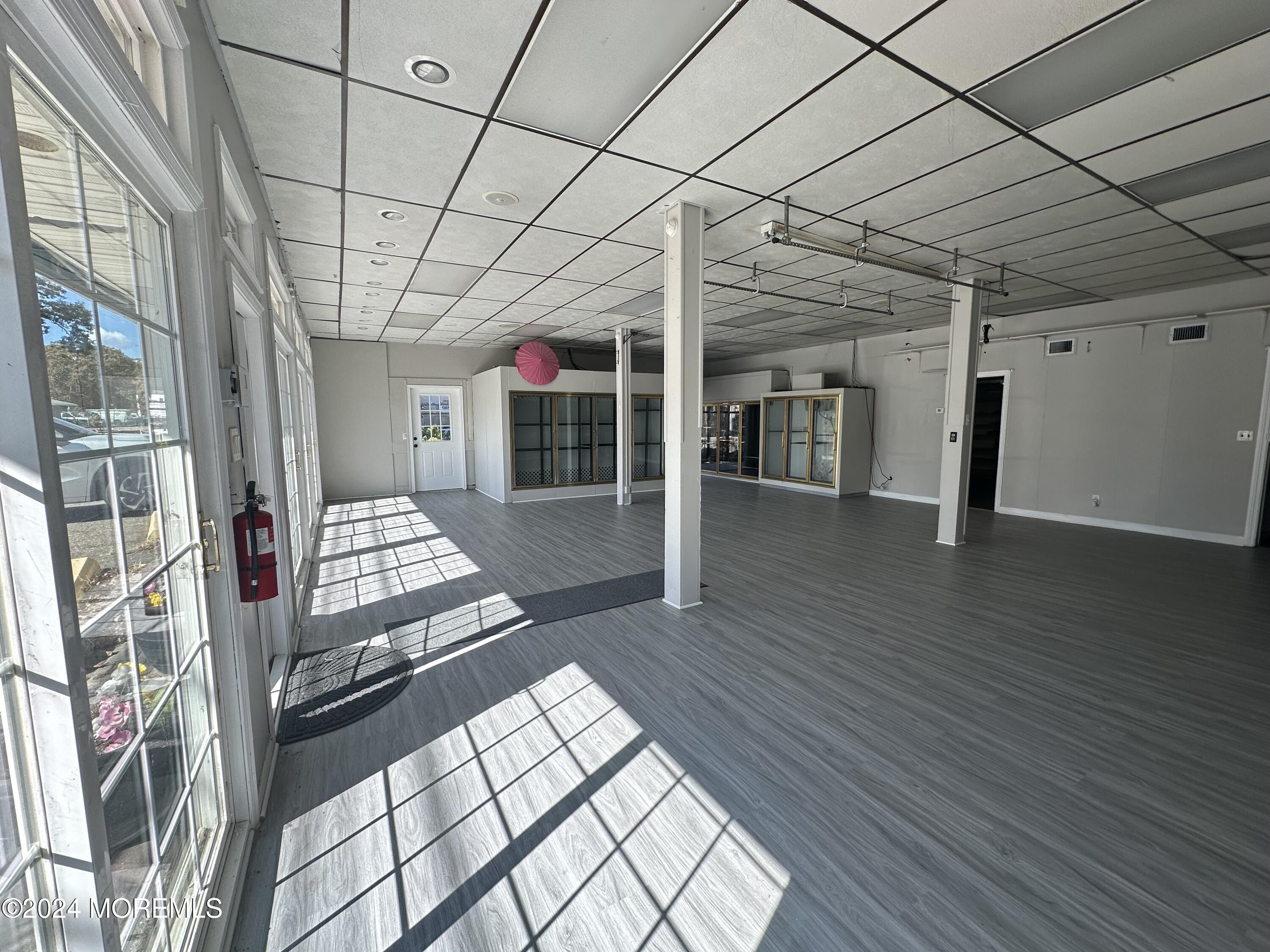 a view of entryway with wooden floor