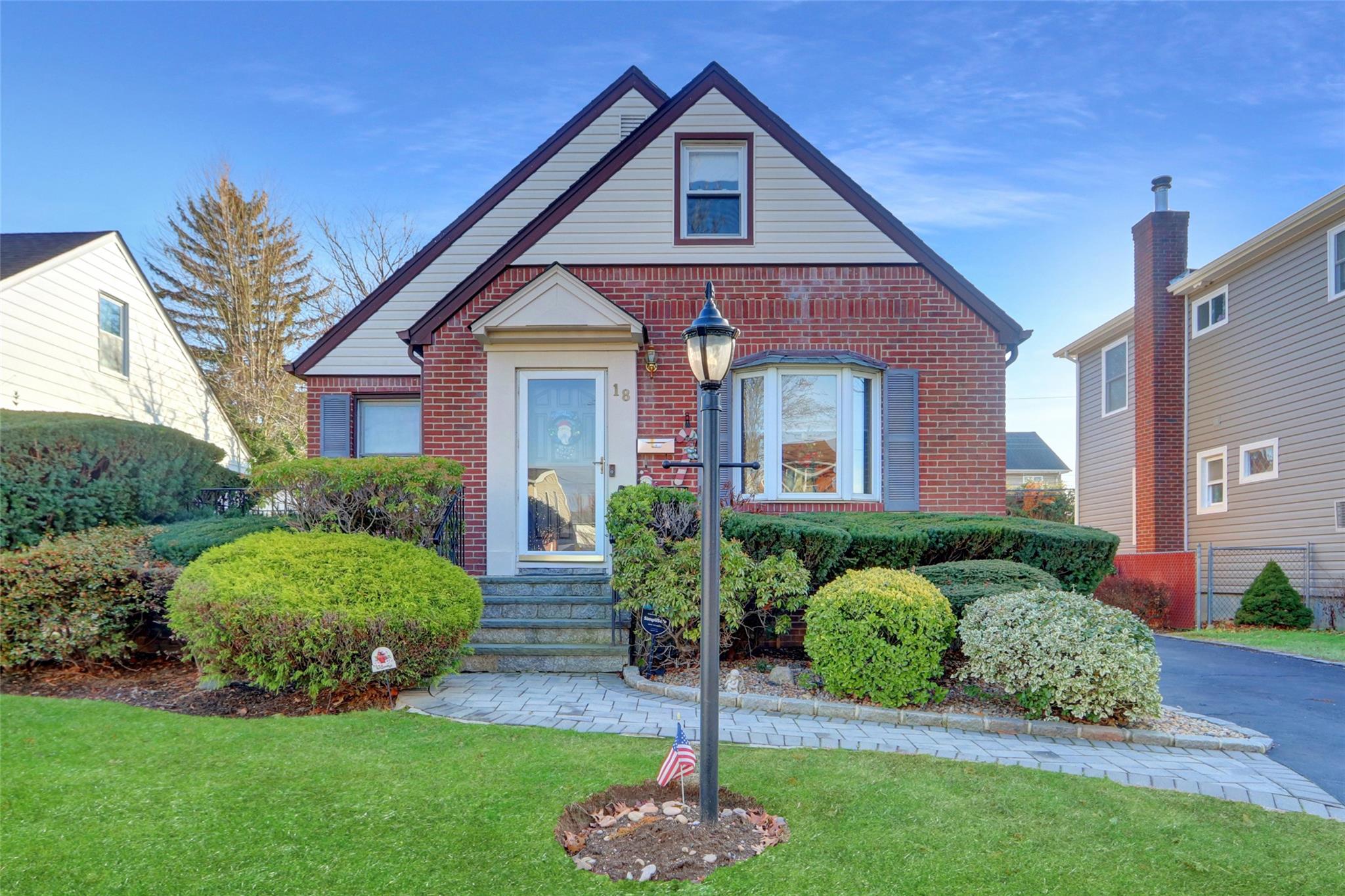 View of front of house with a front lawn