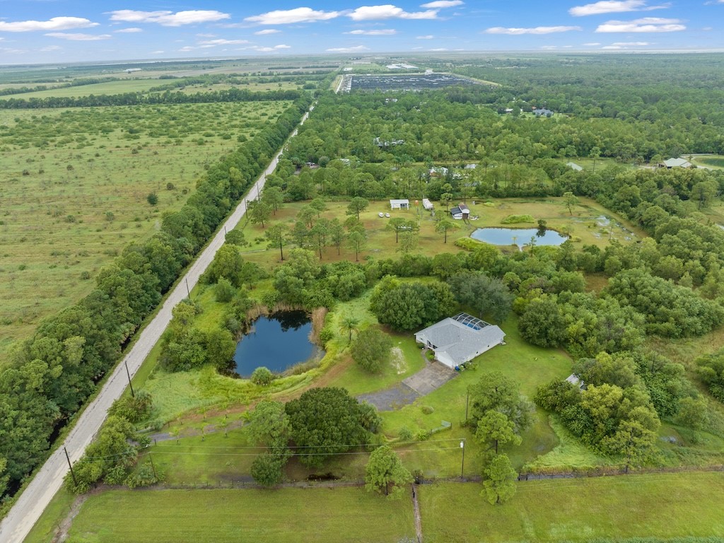 a view of a lake with a yard