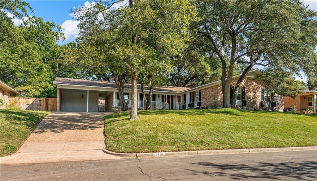 front view of a house with a patio