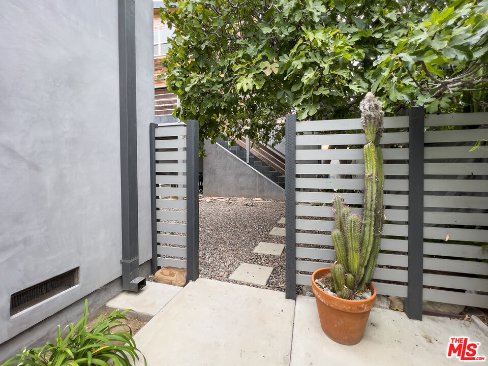 a view of a outdoor space with potted plants