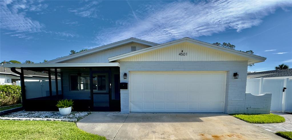 a view of a house with garage