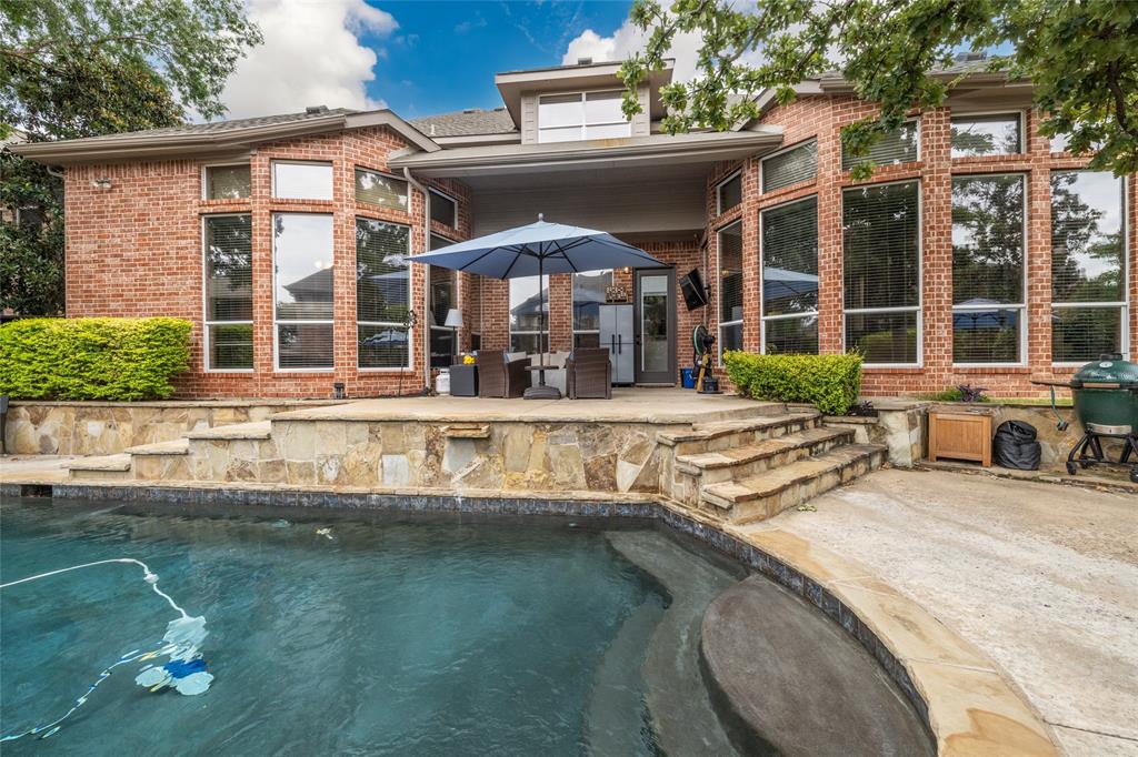 a view of a building with a swimming pool