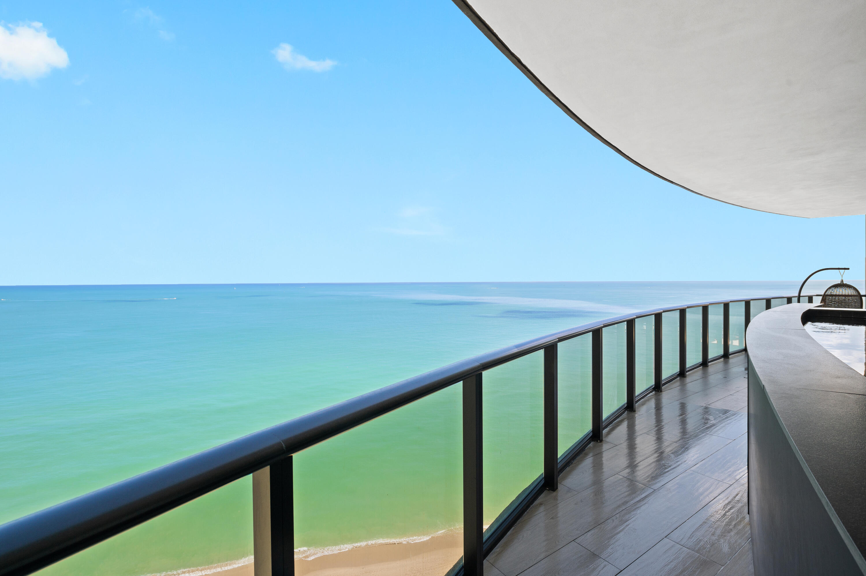 a view of an ocean from a balcony