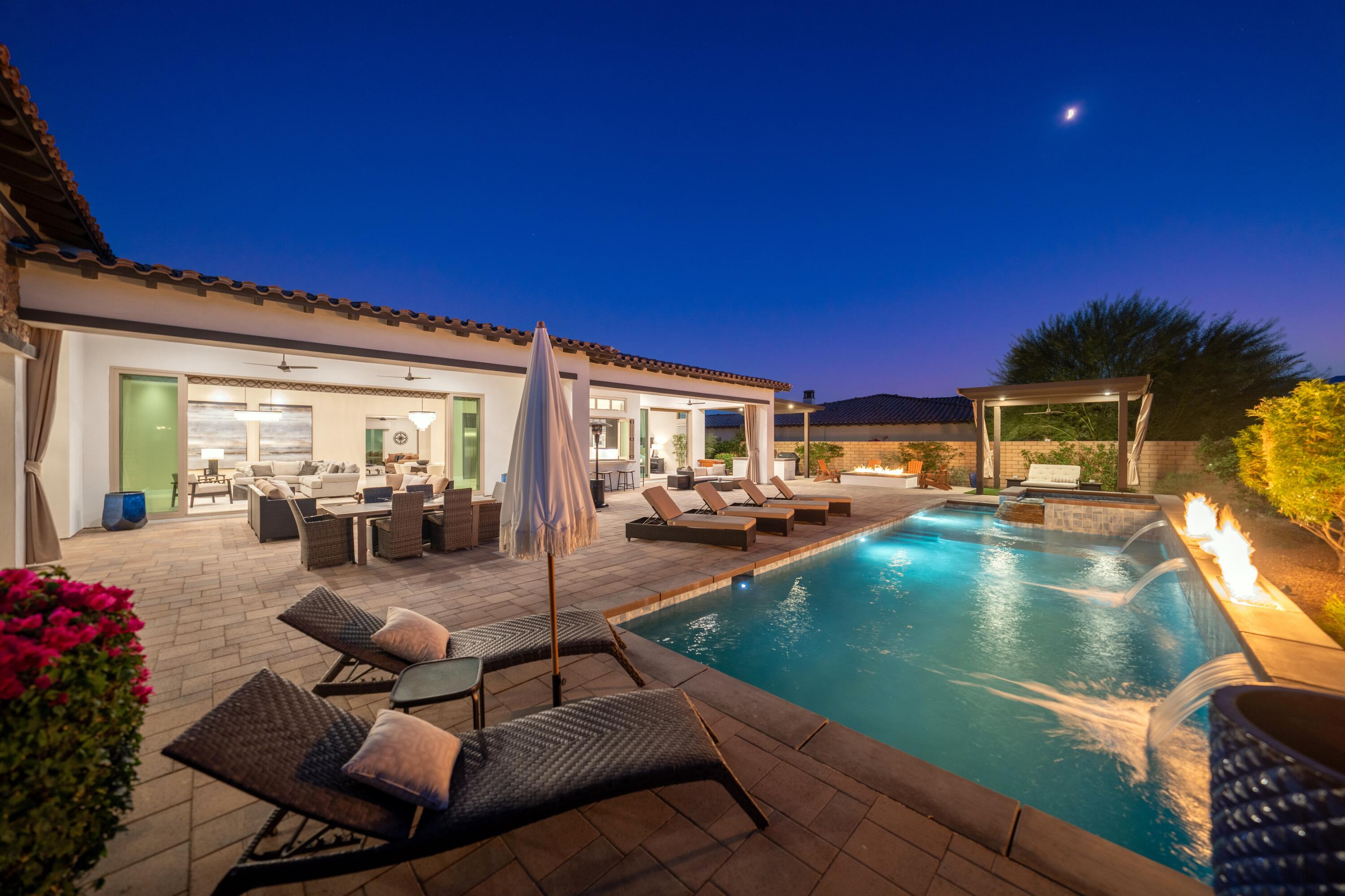 a view of a patio with swimming pool