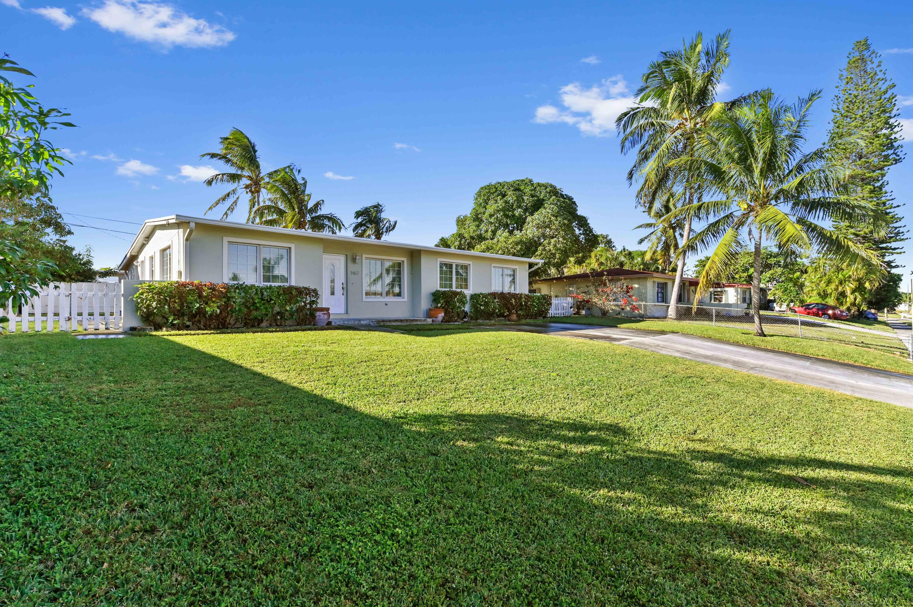 a view of a house with a big yard