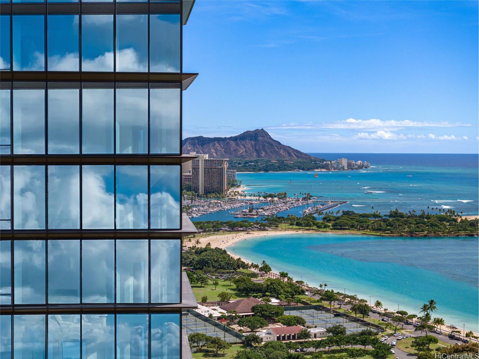 a view of a city with an ocean beach