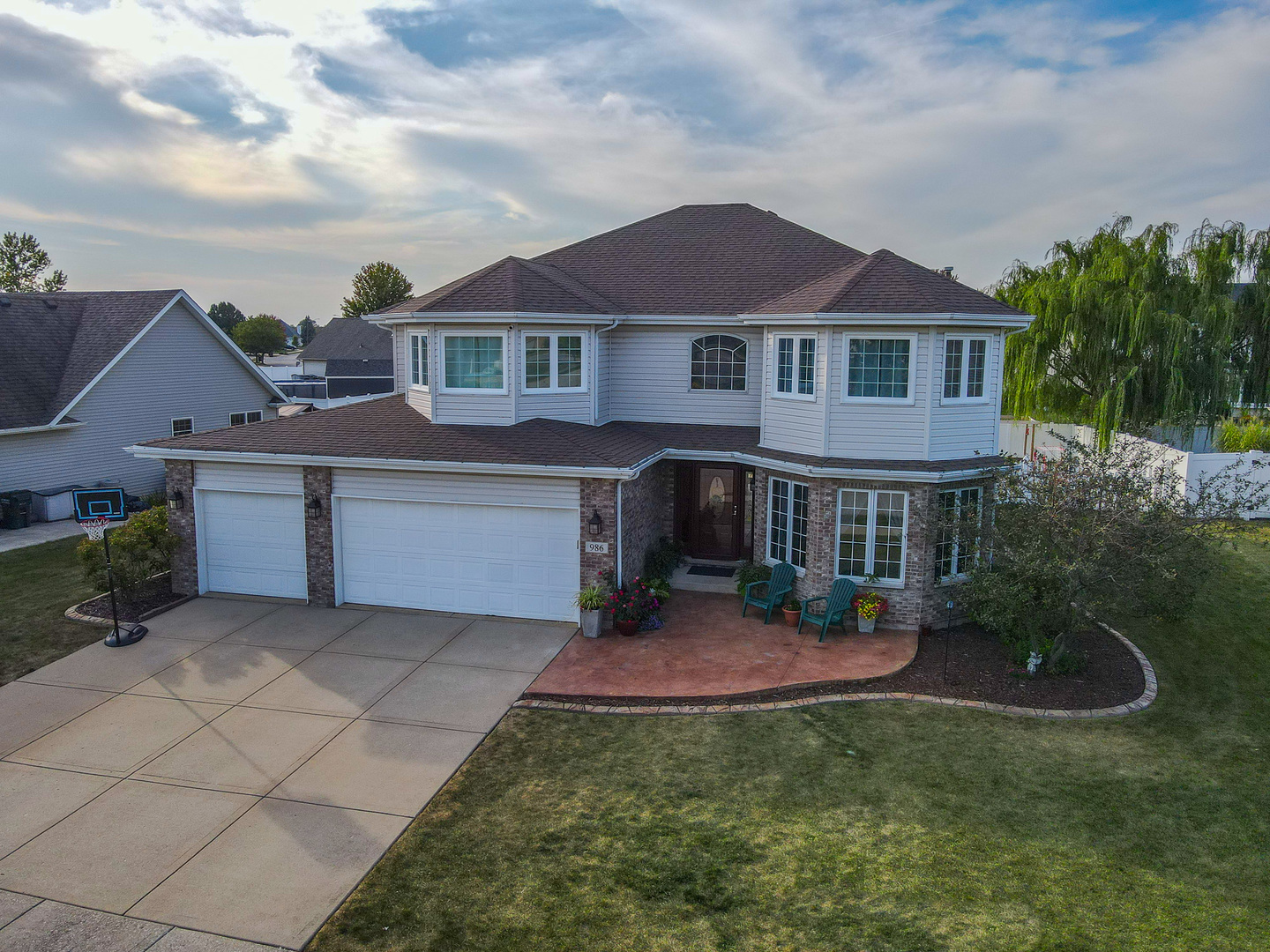 front view of a house with a yard