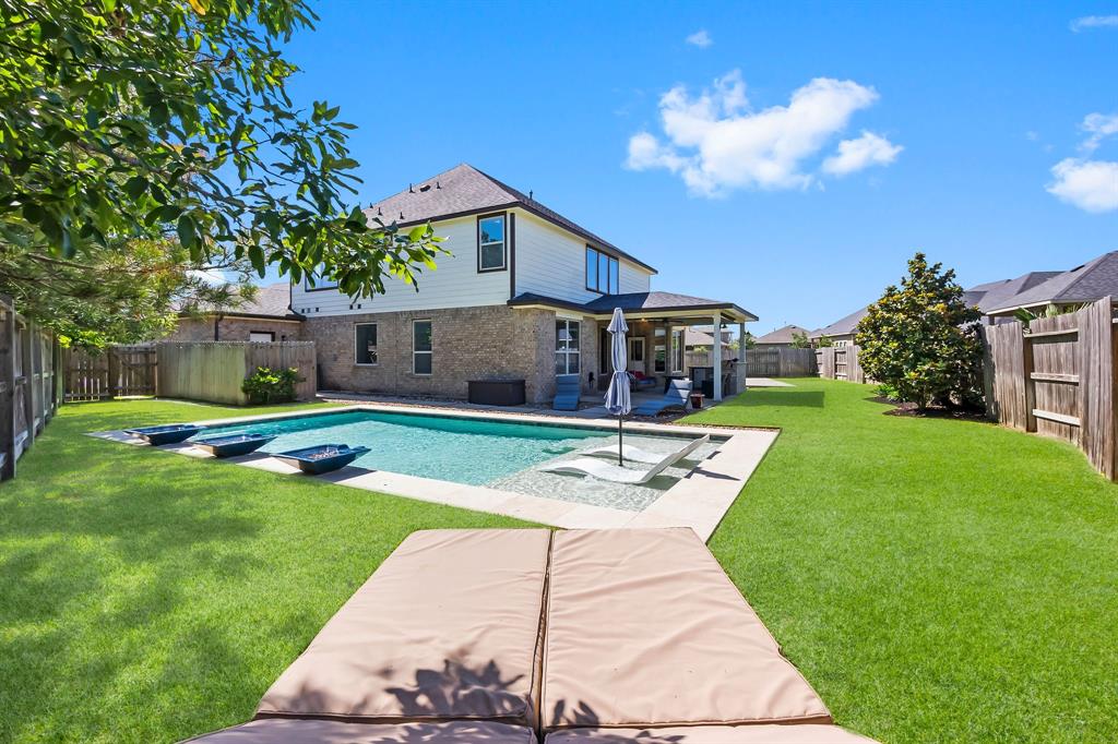 a view of a house with a swimming pool