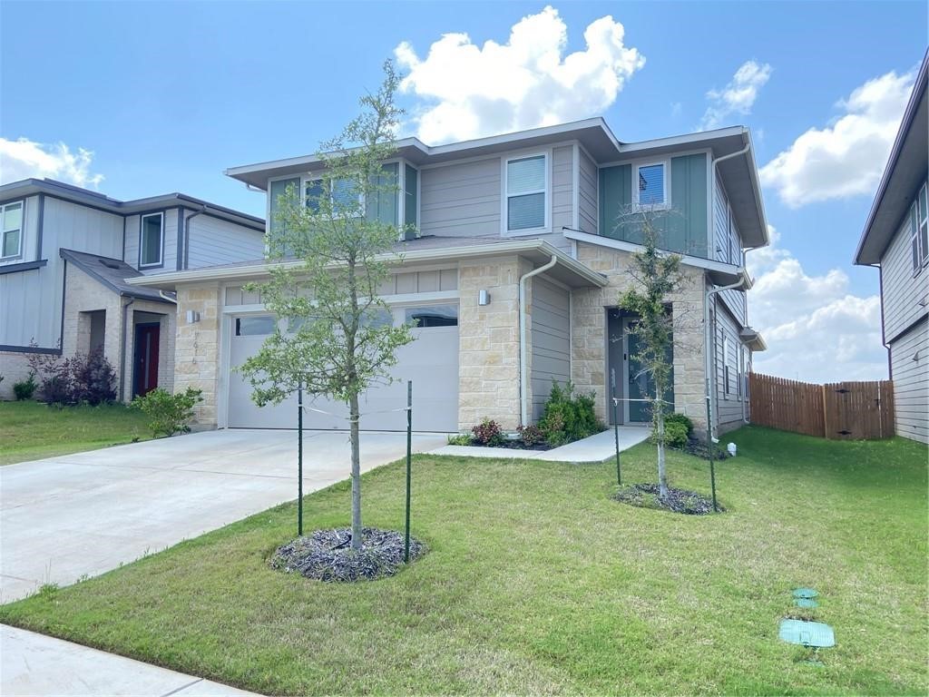 a house view with a garden space