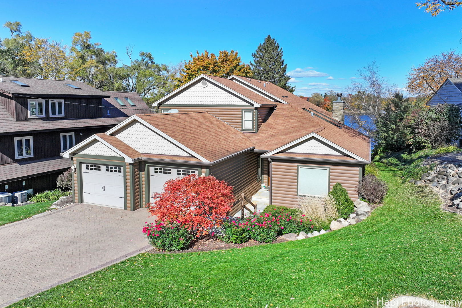 front view of a house with a yard