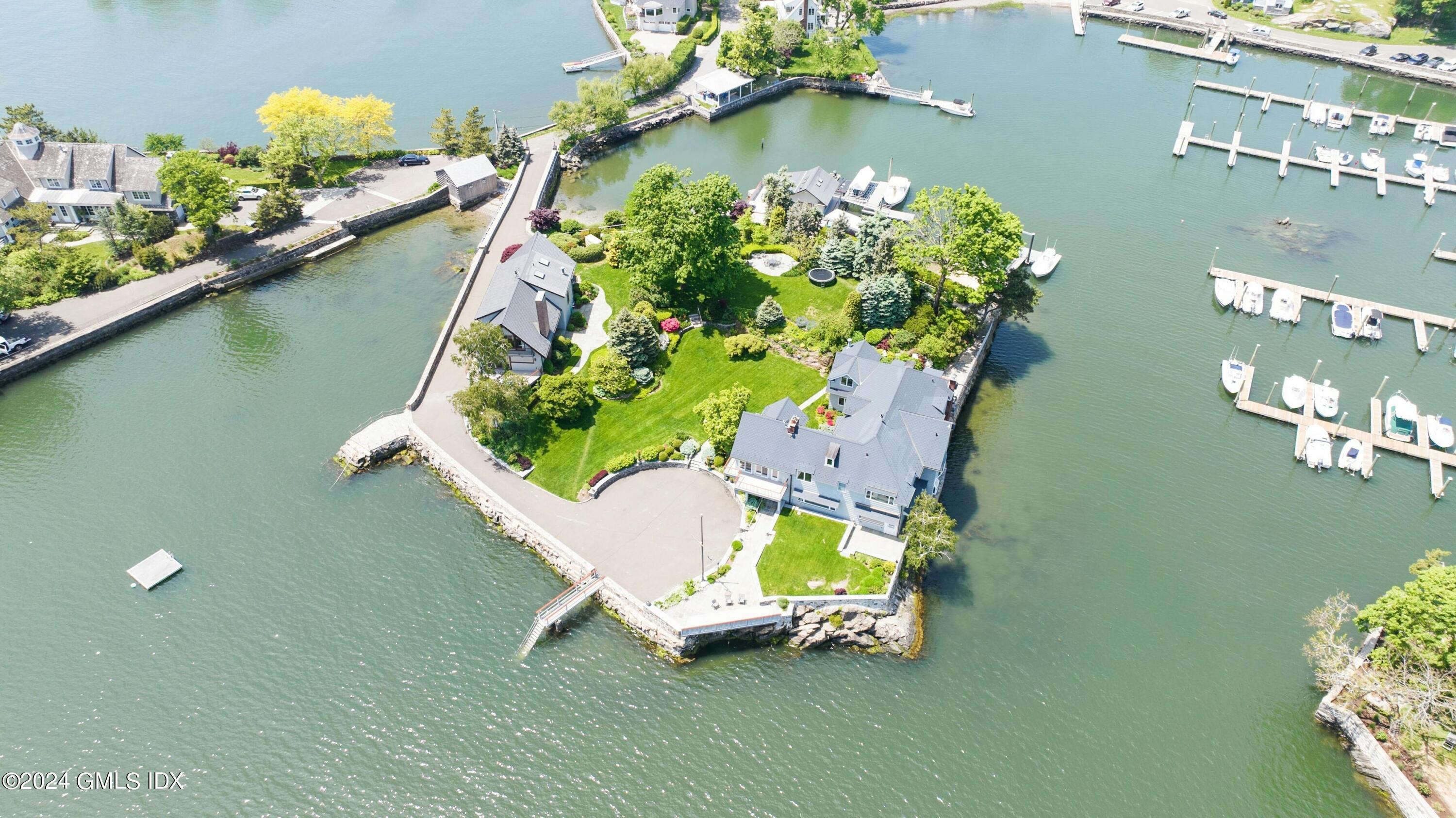 an aerial view of a house a lake view