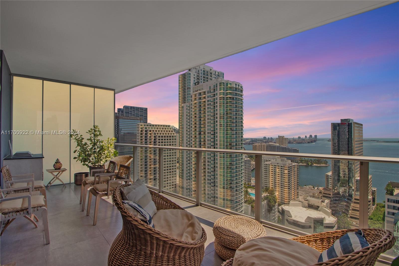 a balcony with furniture and outdoor view