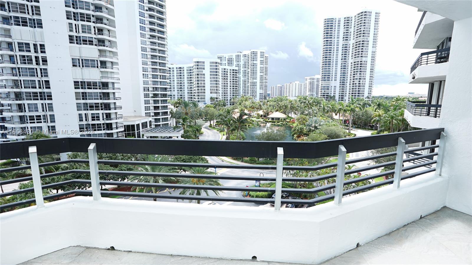 a view of a balcony with an outdoor space