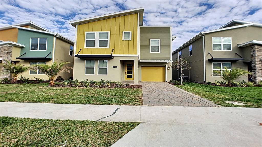 front view of a house with a yard