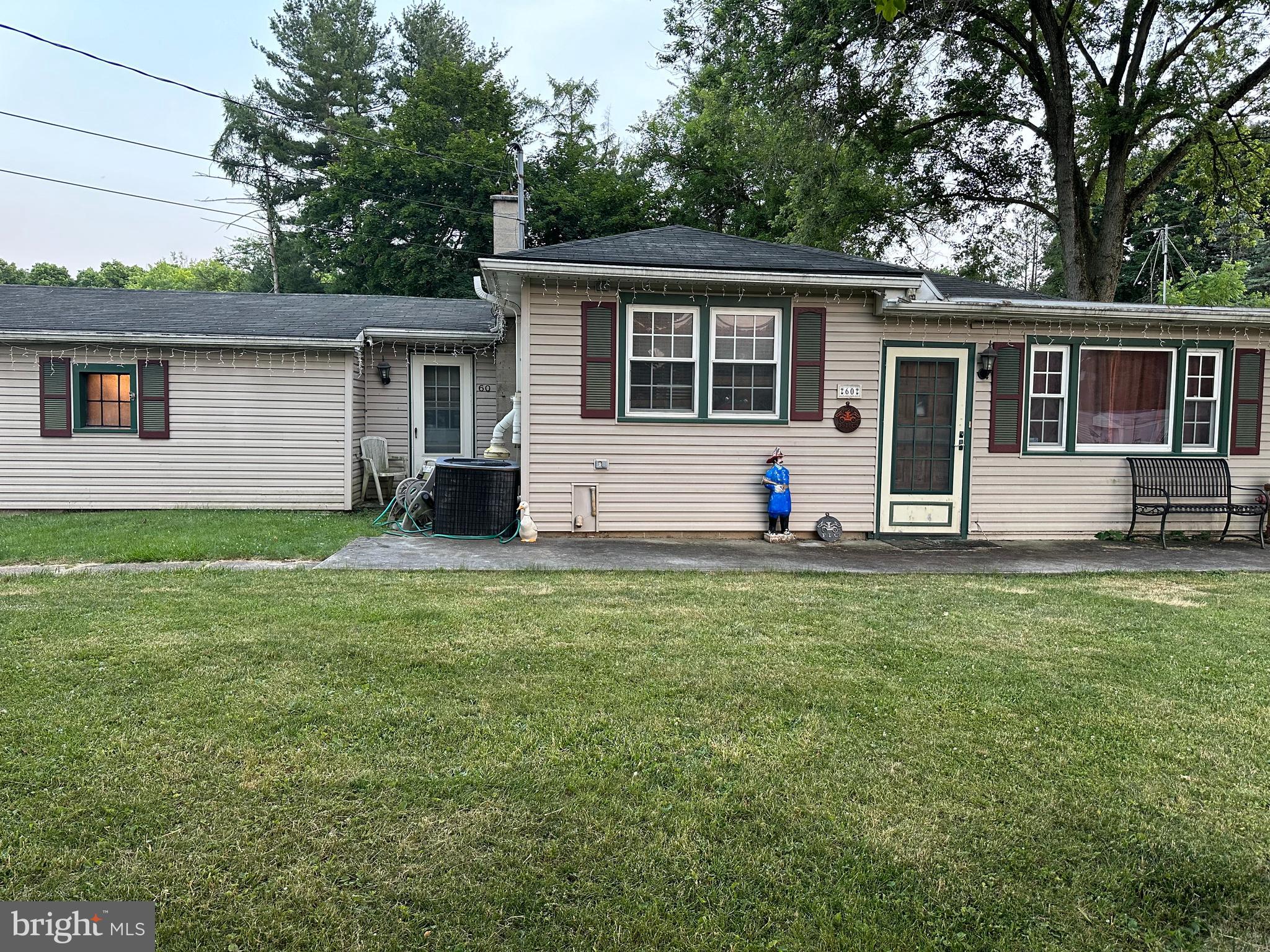 a house view with a garden space