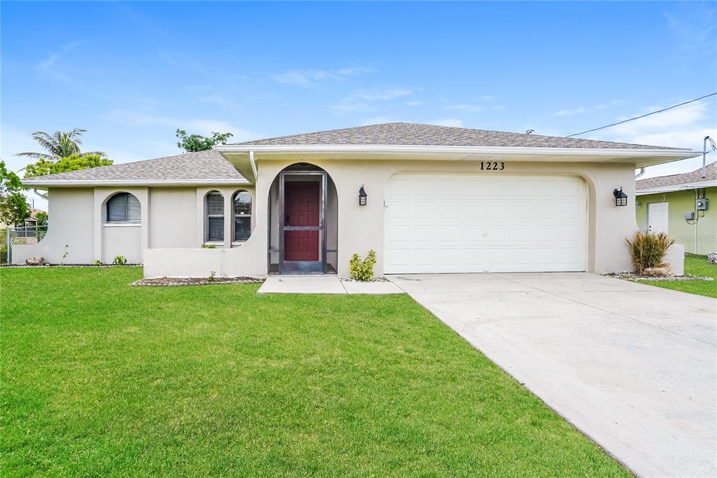 a front view of a house with yard