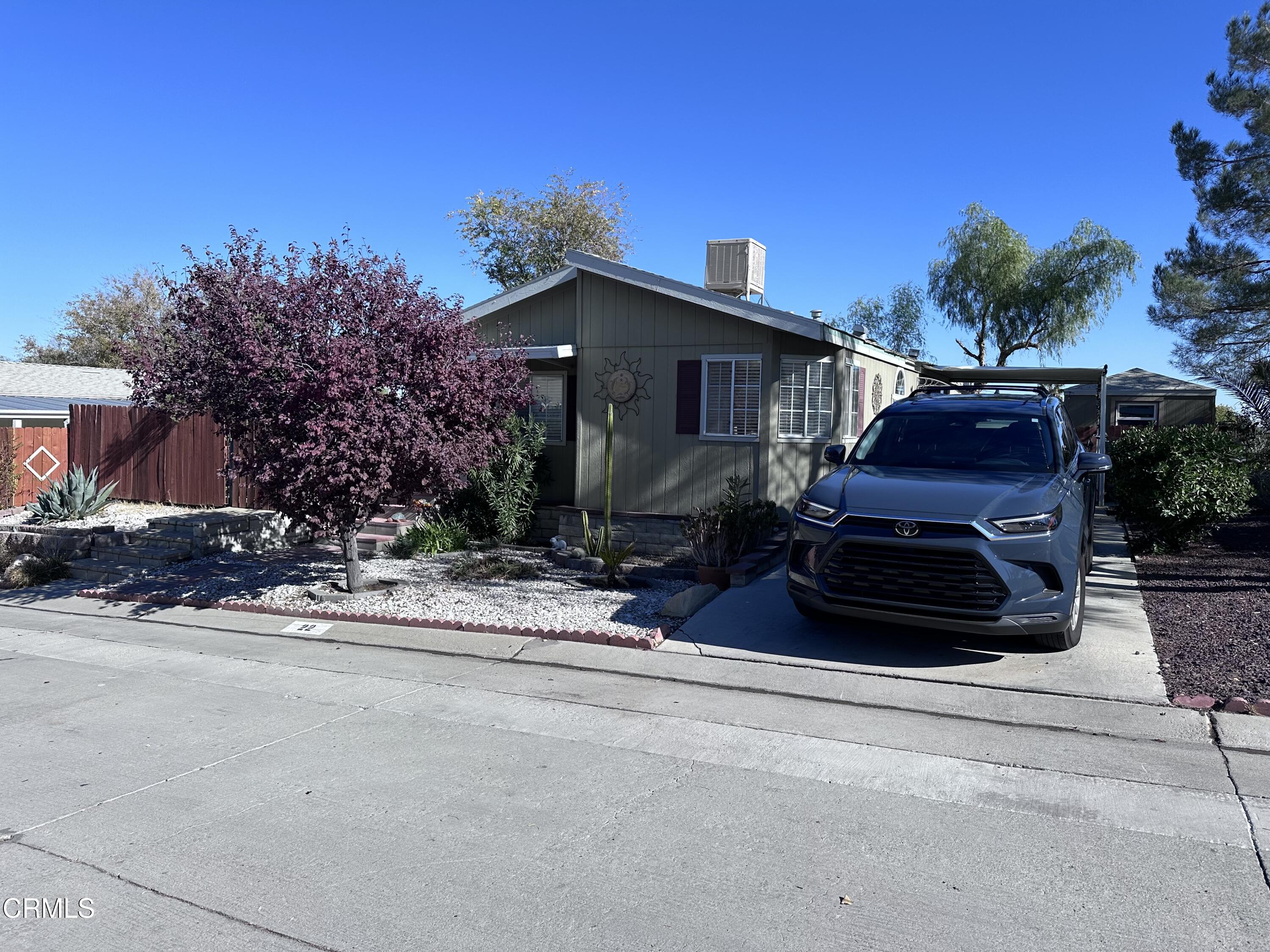 a car parked in front of a house