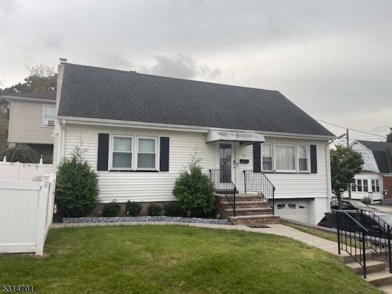 a front view of house with yard