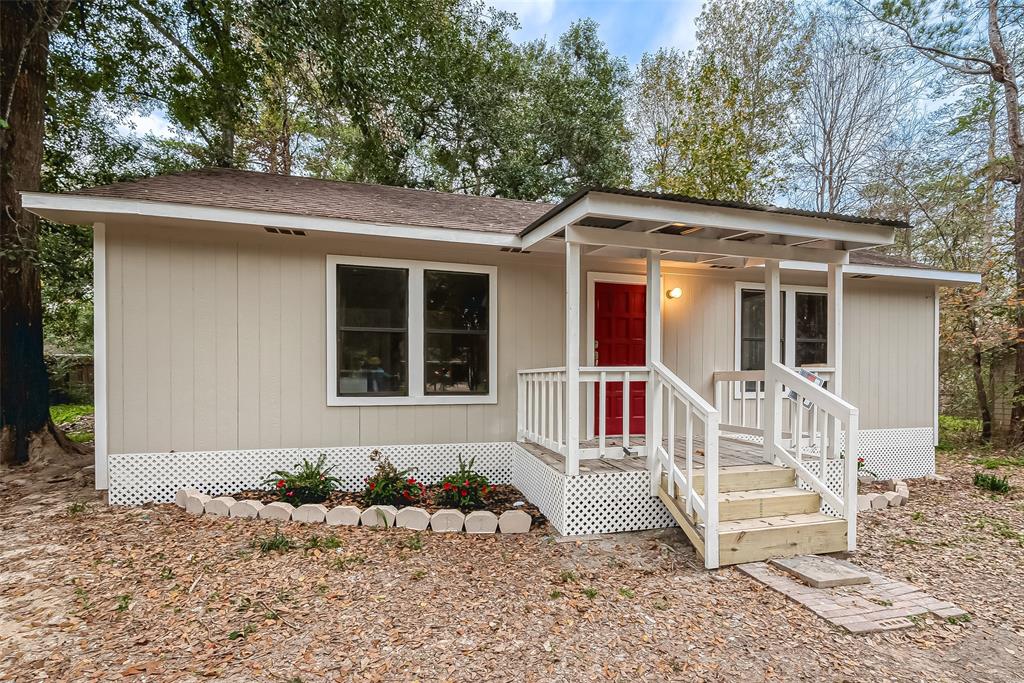 a front view of a house with a porch