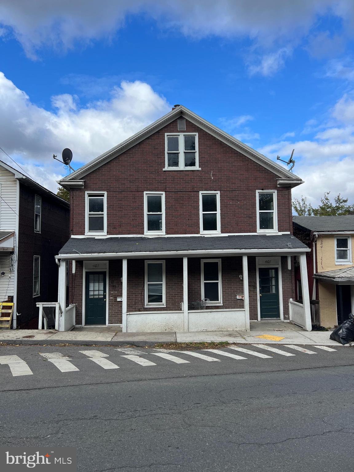 a front view of residential houses