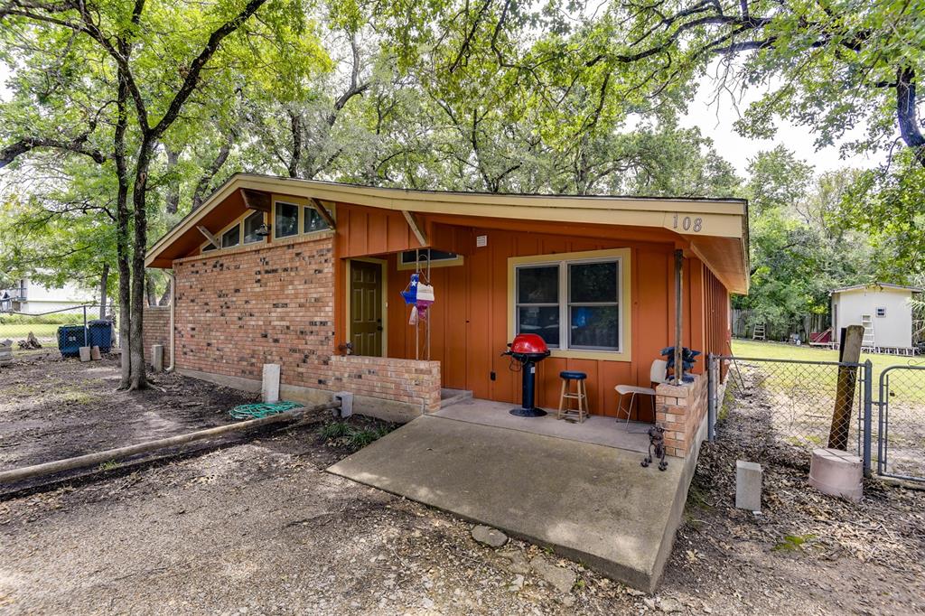 a front view of a house with patio