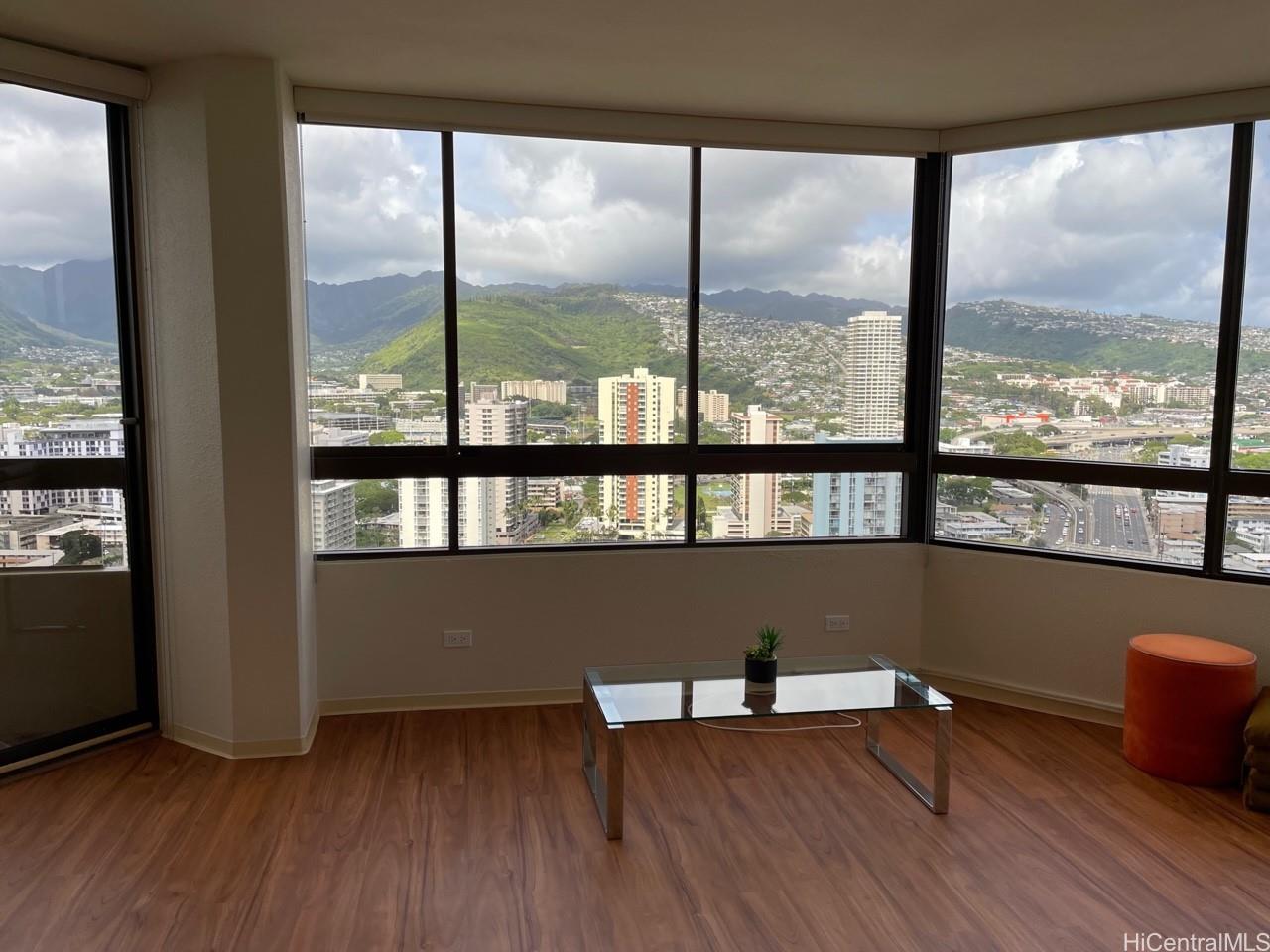 a floor of a room with wooden floor and furniture