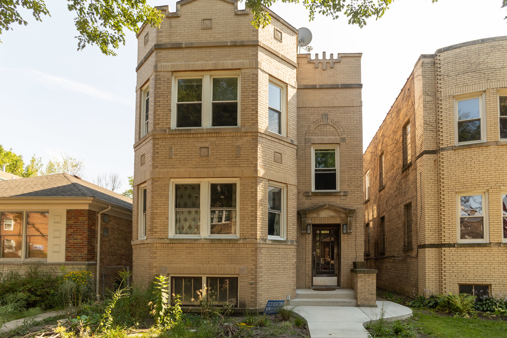 a front view of a multi story residential apartment building