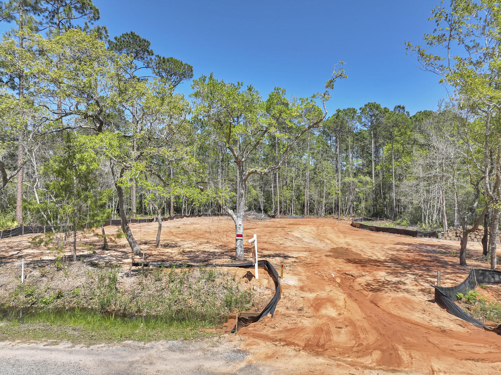 a view of a backyard of the house