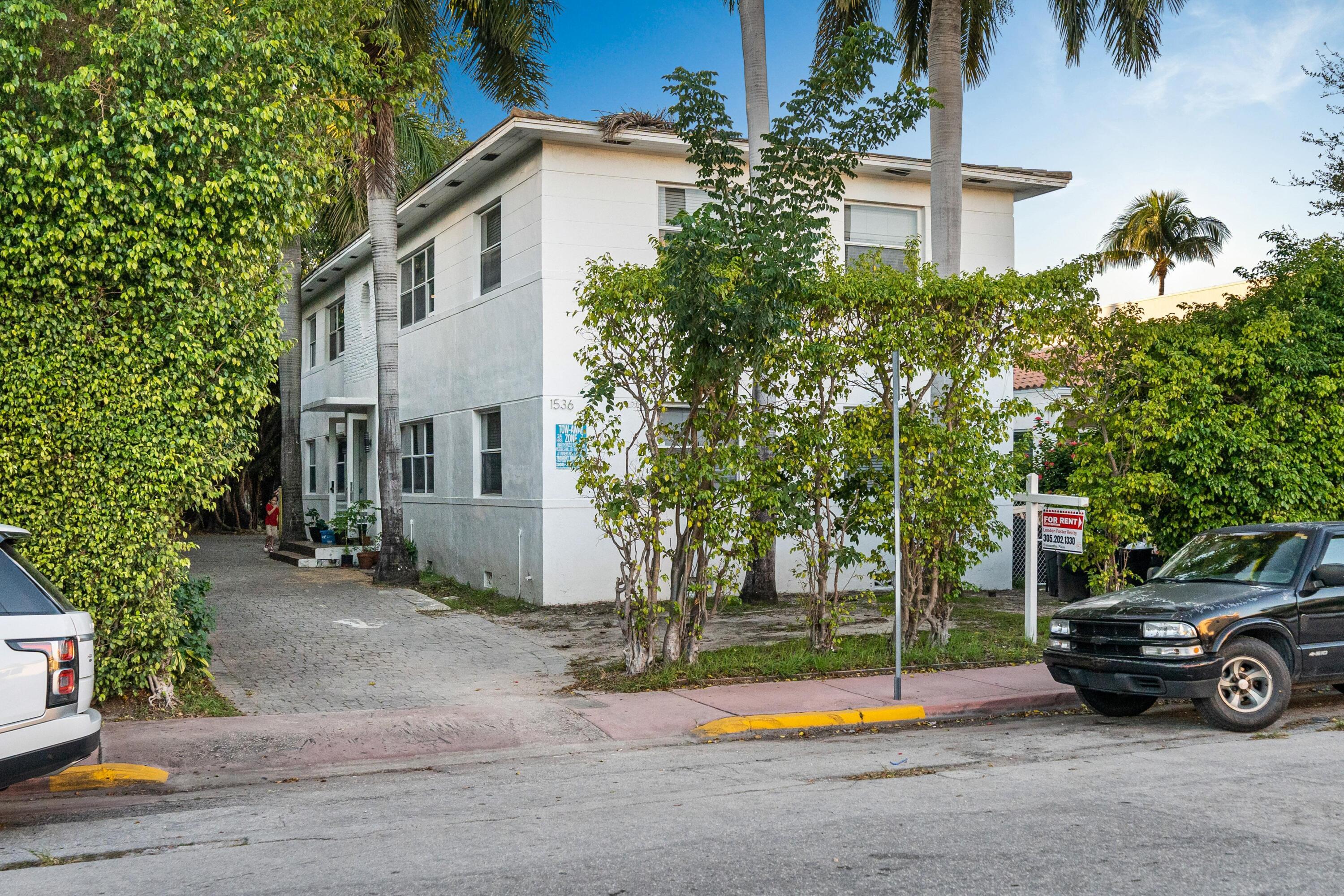 a car parked in front of a house