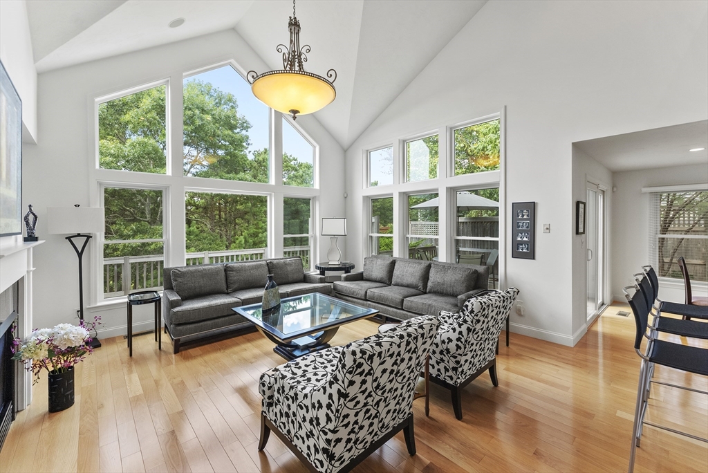 a living room with furniture and a table