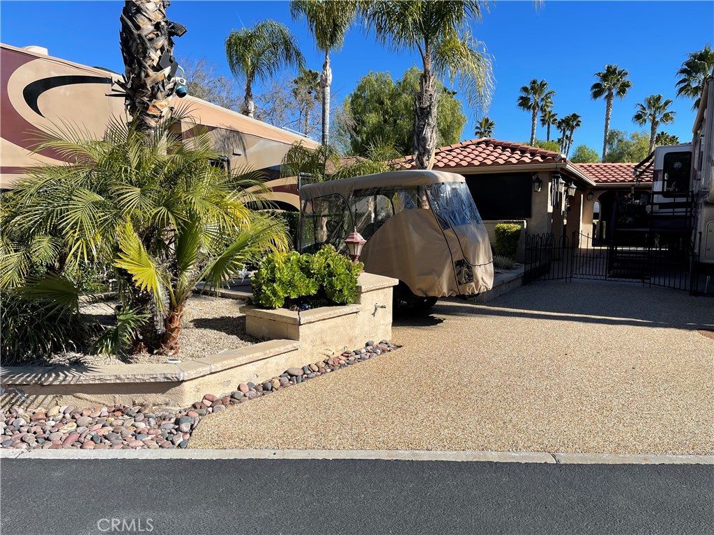 a view of a yard with an outdoor space