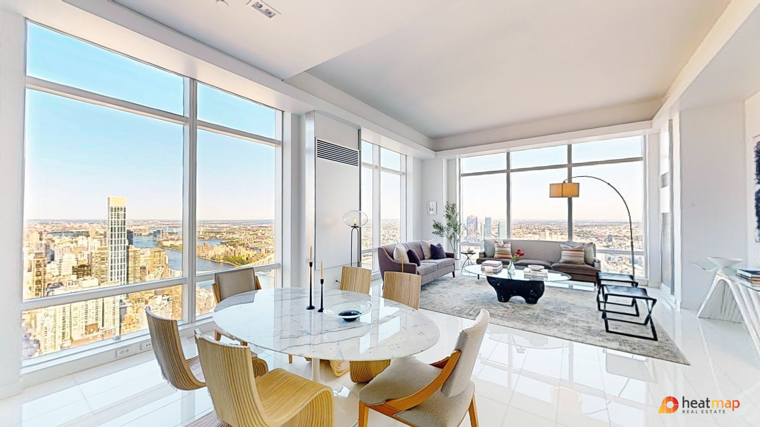 a dining room with furniture water view and wooden floor