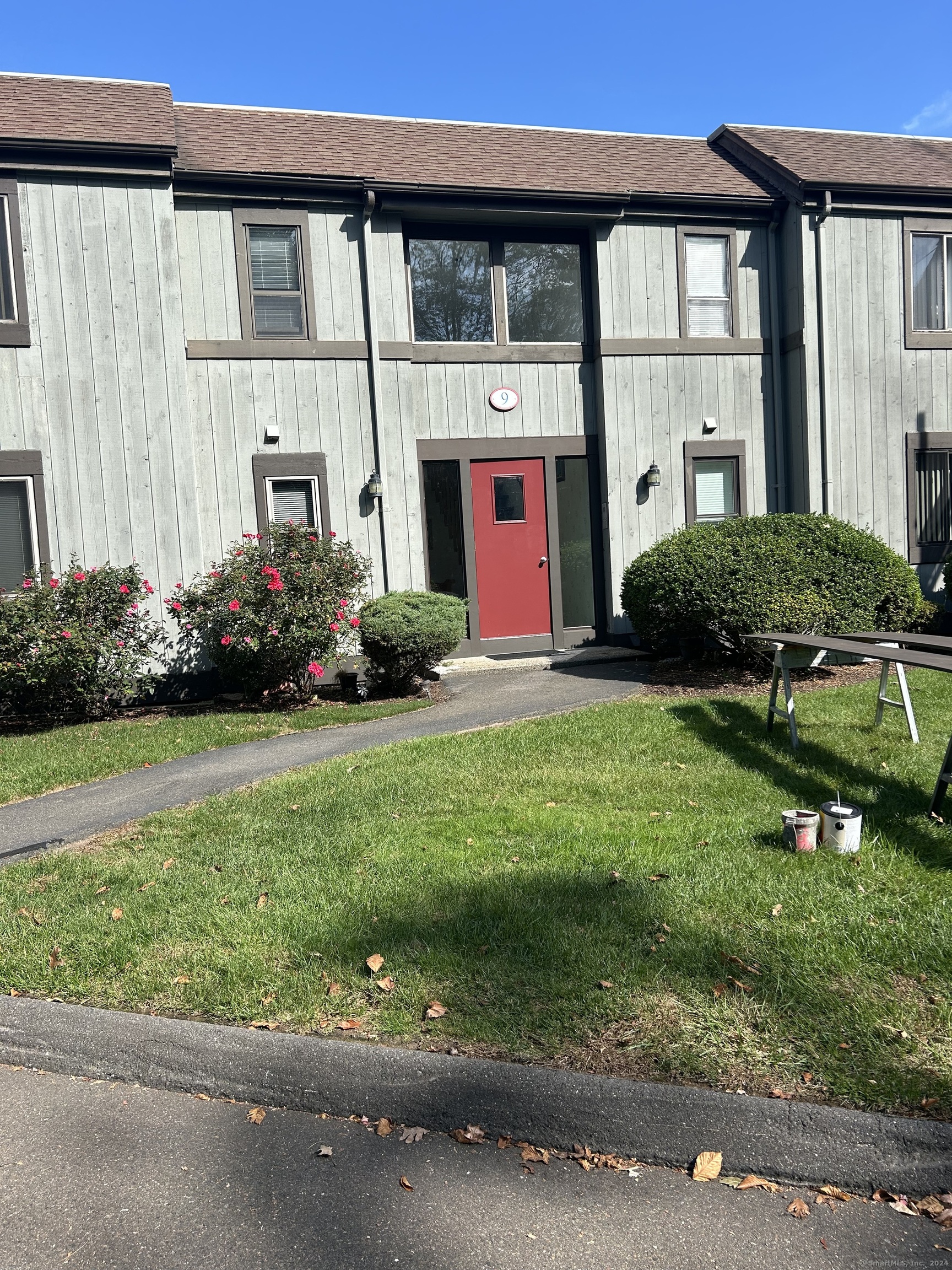 front view of a house with a yard