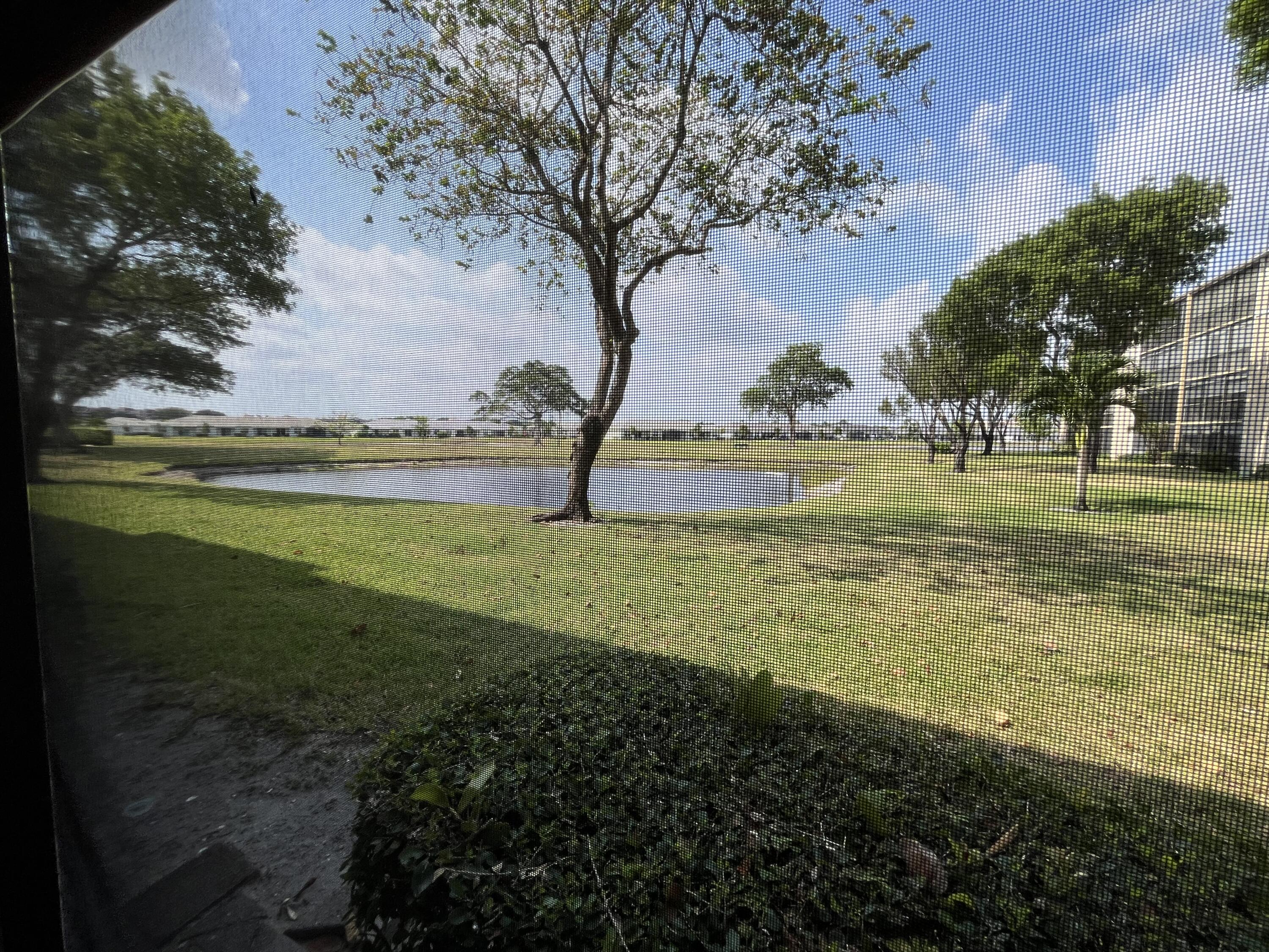 a view of an outdoor space and a lake view