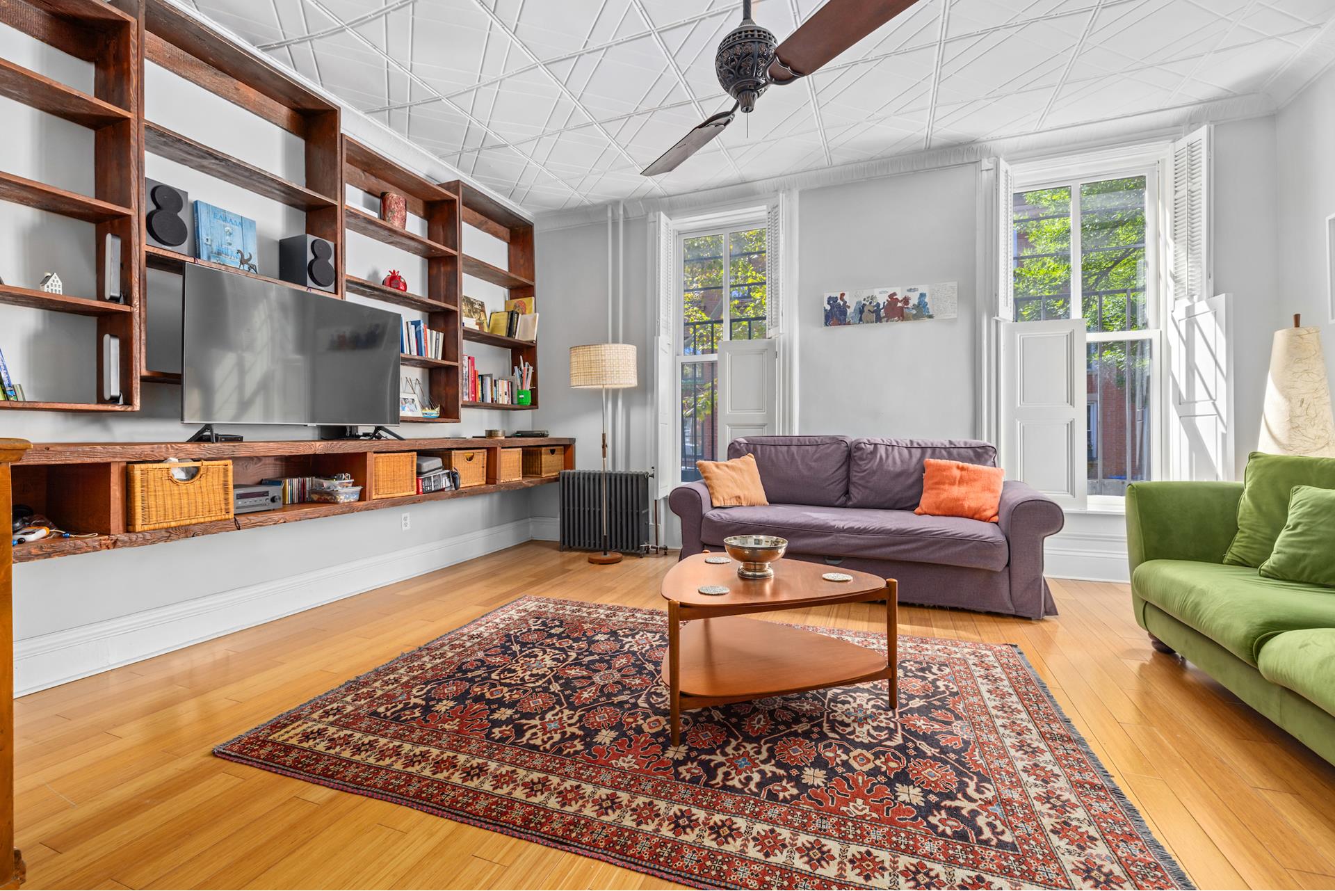 a living room with furniture and a rug