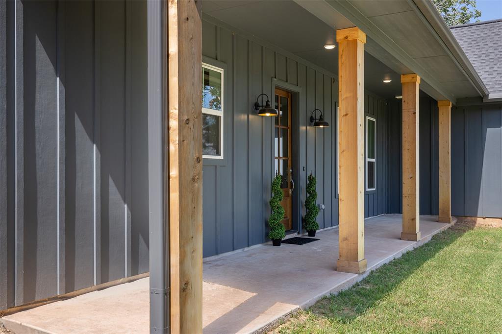 a view of a bathroom with a glass door and porch