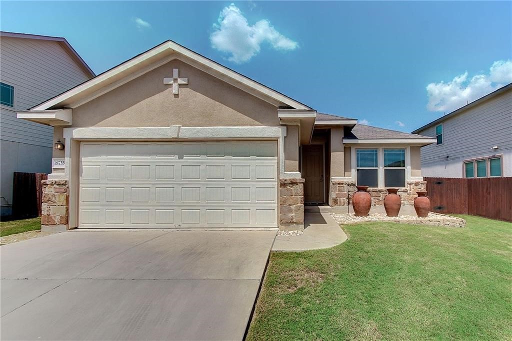 a front view of house with yard