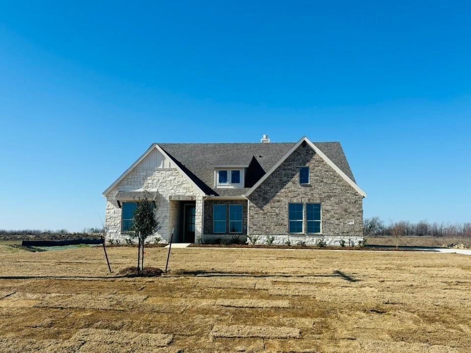 a house with river in front of it