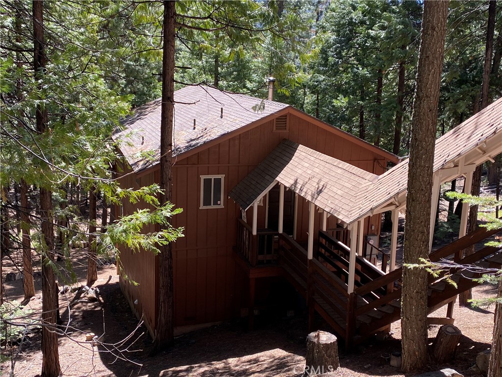 a house with trees in front of it