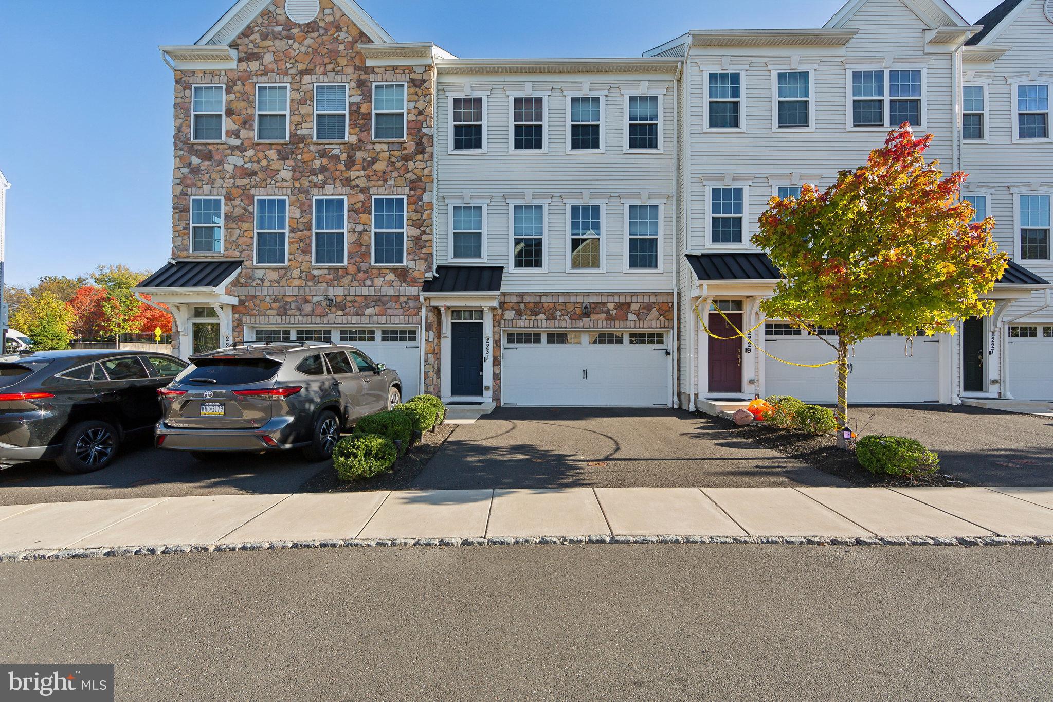 a cars parked in front of a brick building