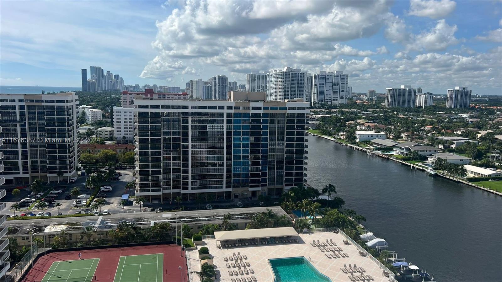 a view of a city with tall buildings