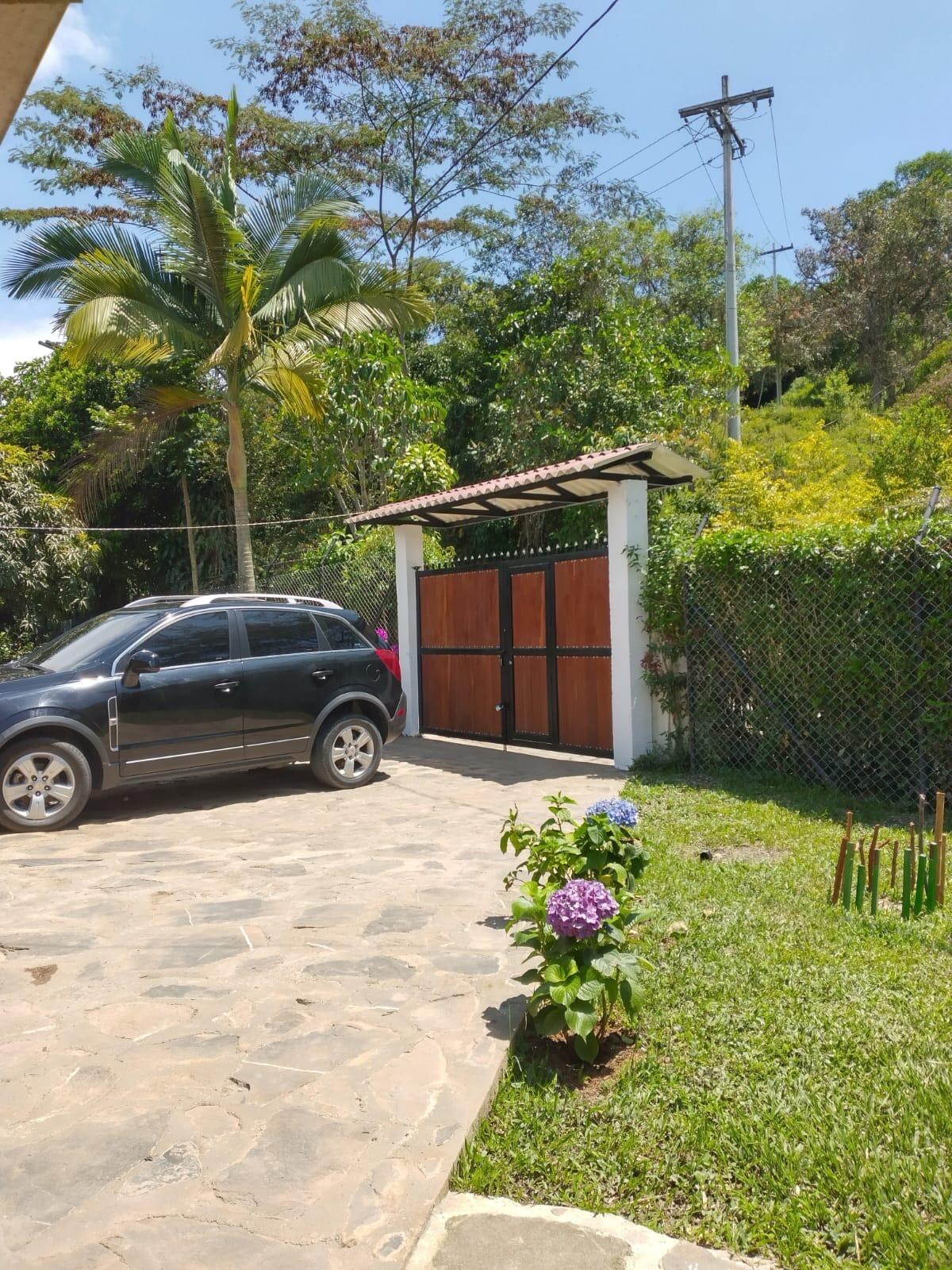 a view of a backyard of the house