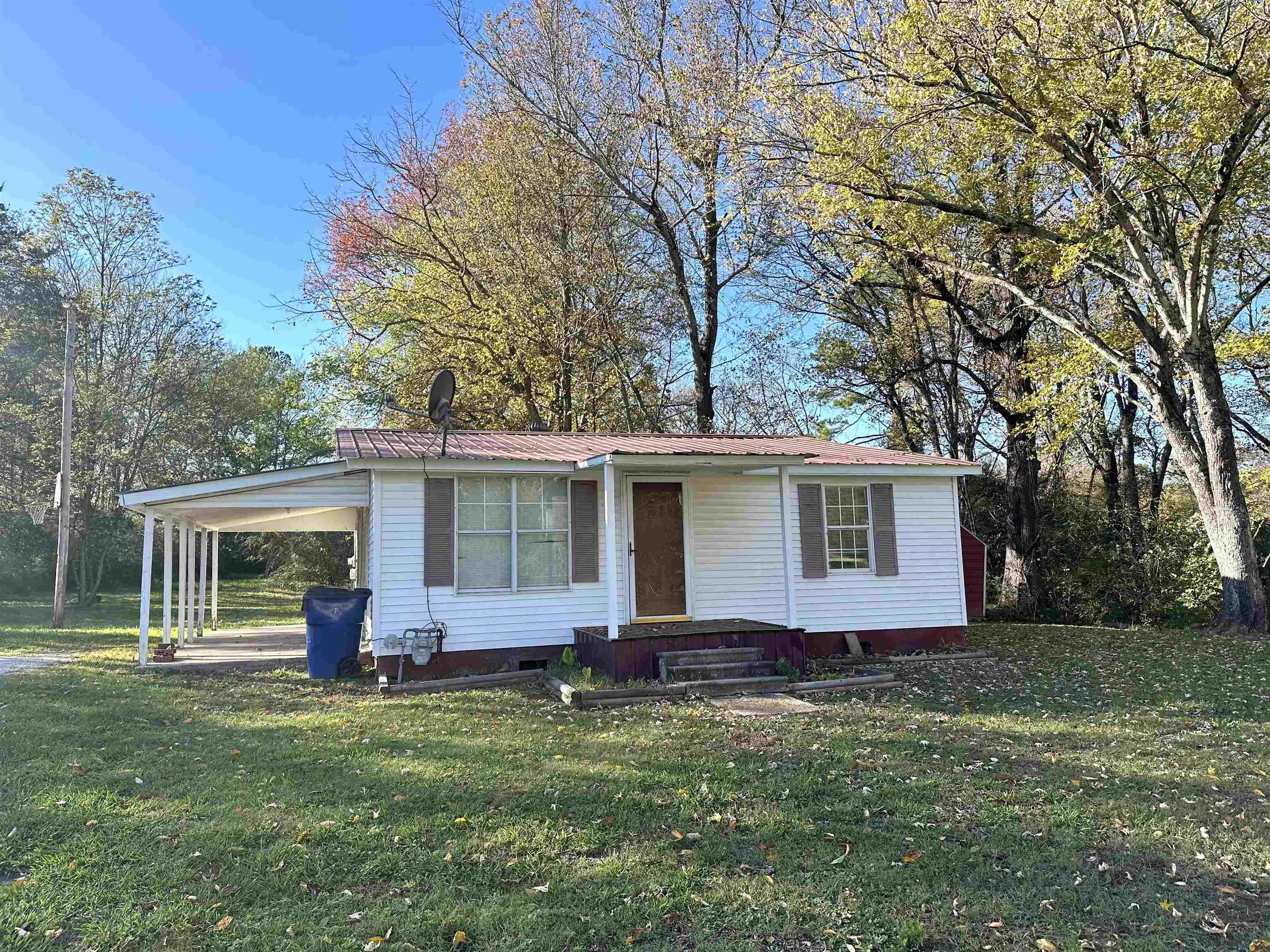 front view of a house with a yard